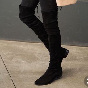 Over the knee black booties